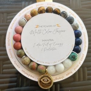 Get ready to shine with this 14KGold Dipped Cubic Zirconia Charm Beaded Bracelet